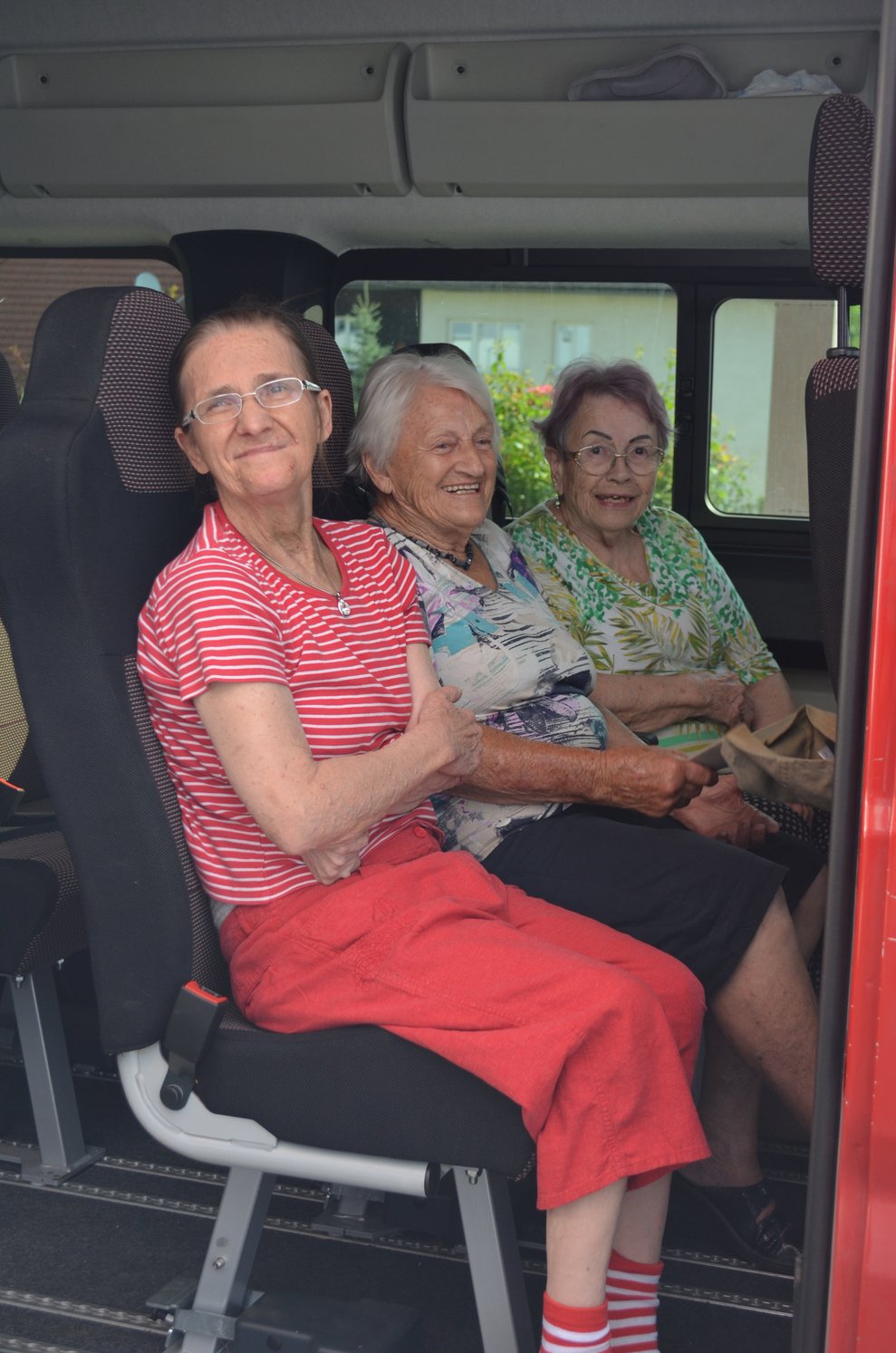 Bewohnerinnen im Bus