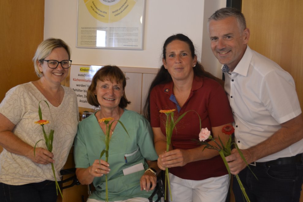 Menschen mit Blumen