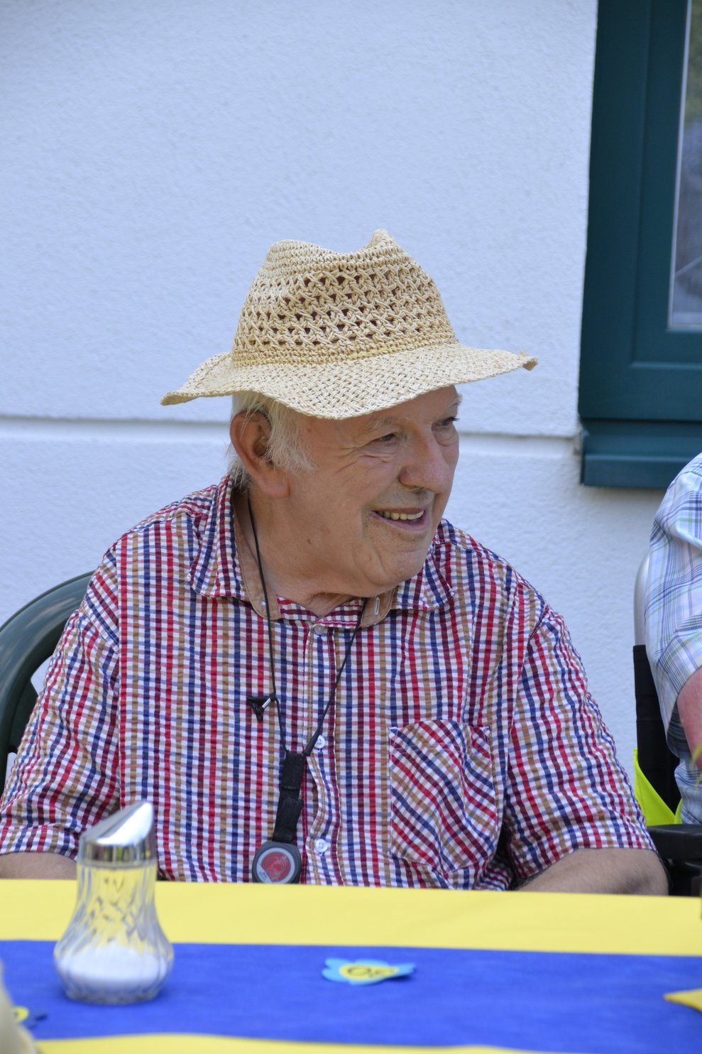 Mann mit Strohhut