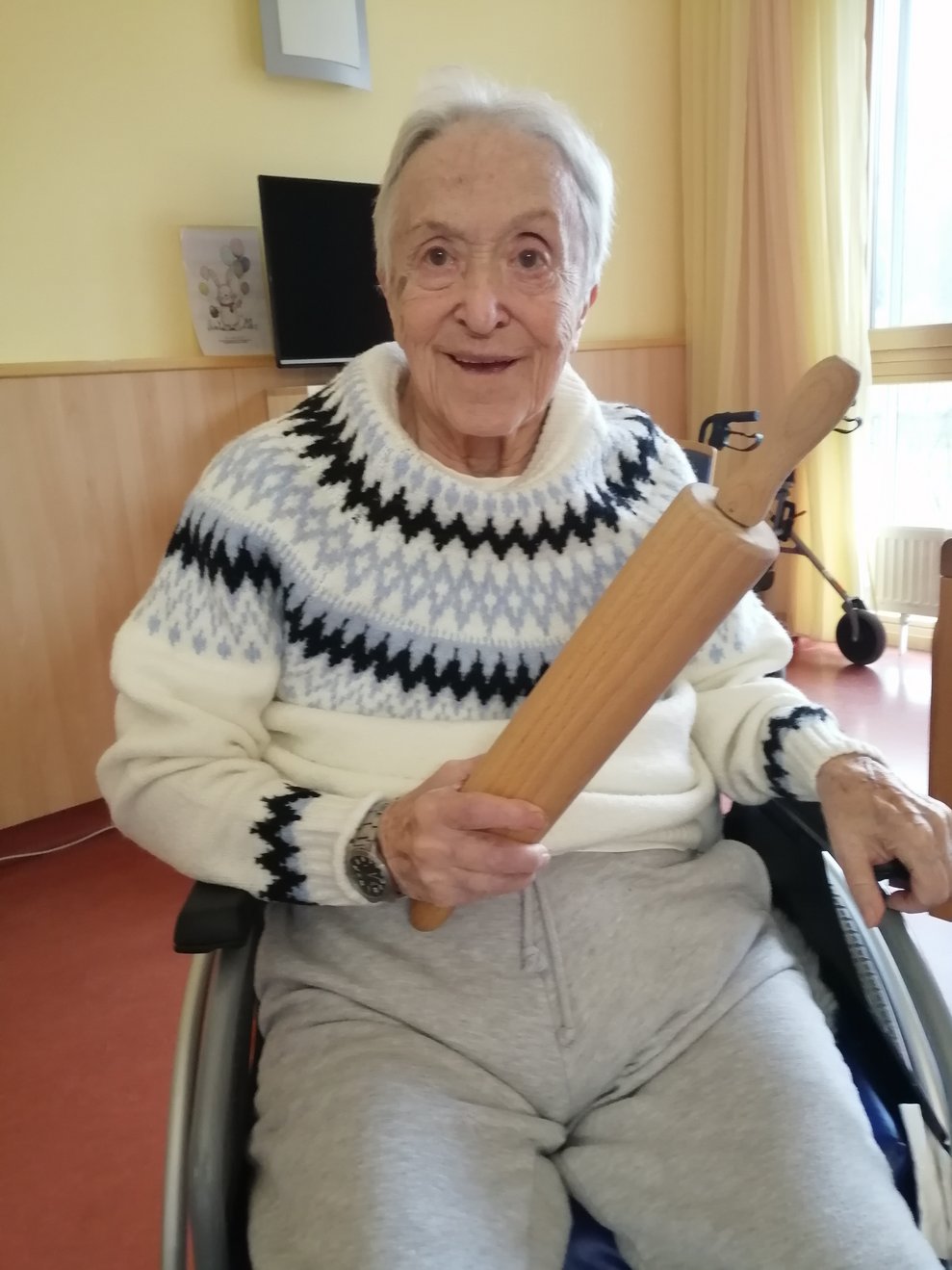 Eine Frau mit Teigrolle
